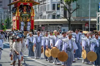 A still Kime pulled: a festival float coming down the street